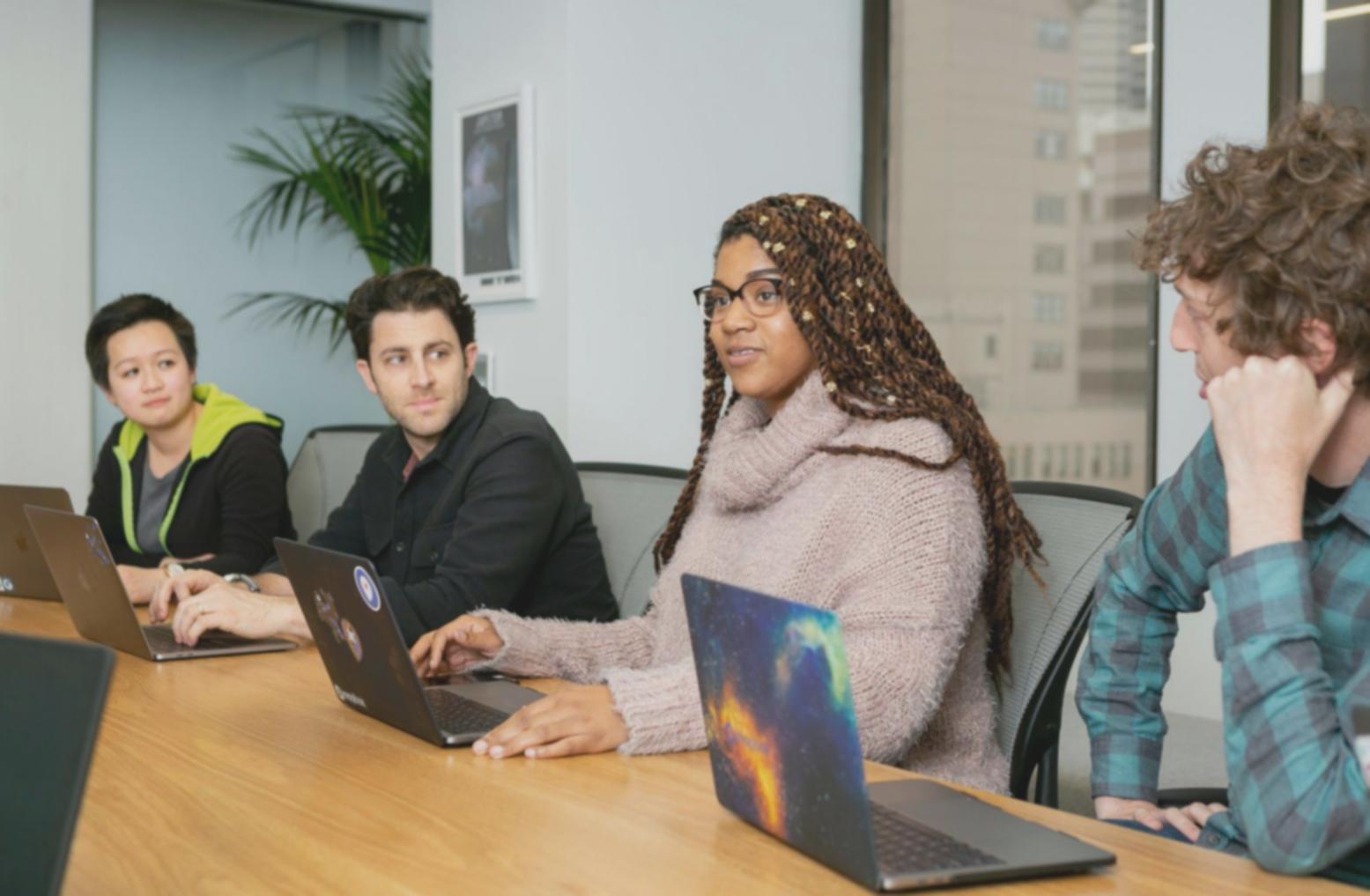 Modern financial modeling session with multiple monitors displaying complex valuation models and market analysis tools